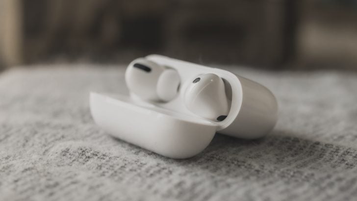 Photo of airpods inside the charging case with open lid