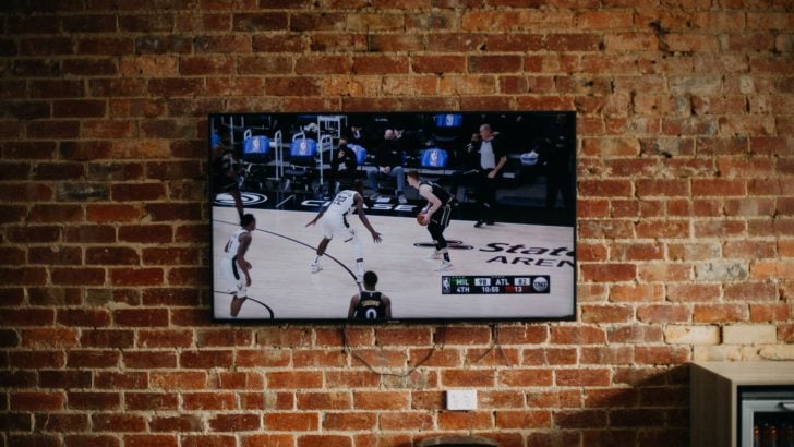 Photo of flat screen tv mounted on a wall