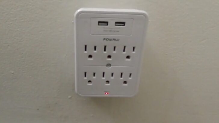 Photo of surge protector mounted on a wall outlet