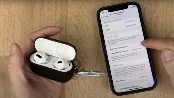 Photo of person turning automatic ear detection off in iphone connected to airpods