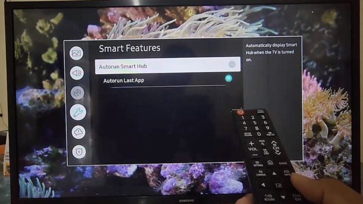 Photo of person disabling autorun smart hub feature on samsung tv