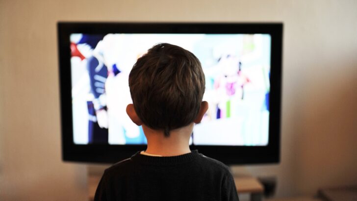 Photo of child watching tv