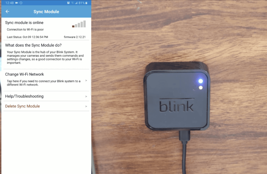 Photo showing the Wi-Fi strength inside the Blink app and a Blink Sync Module