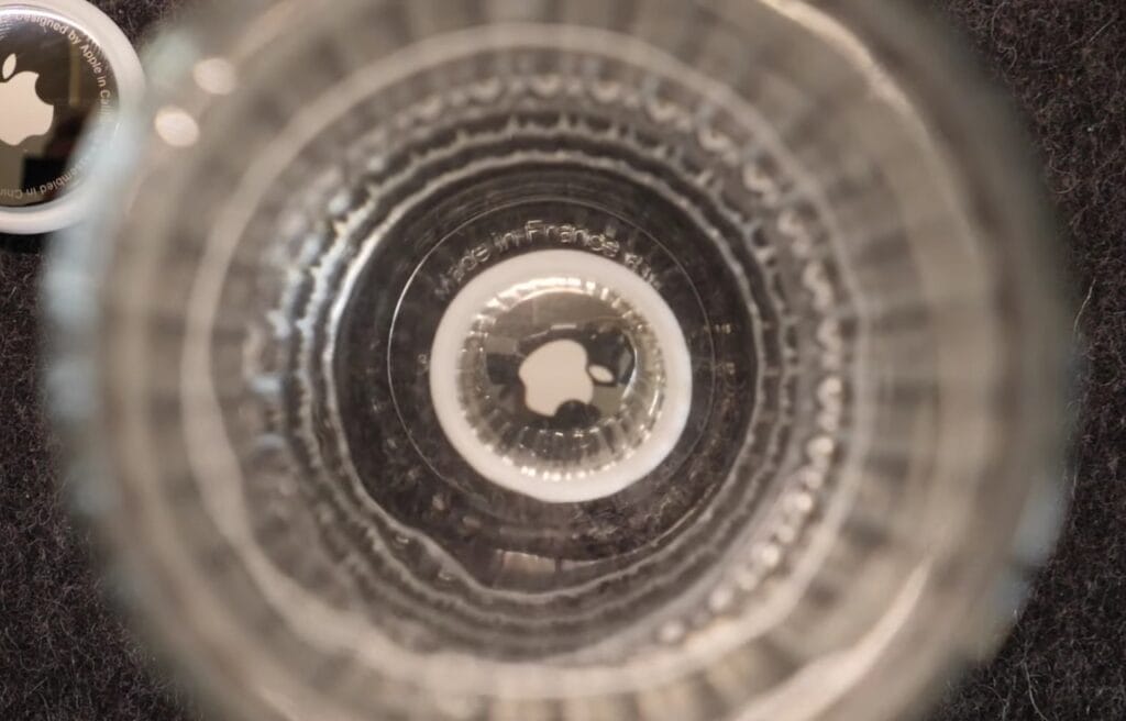 Apple AirTag submerged in water
