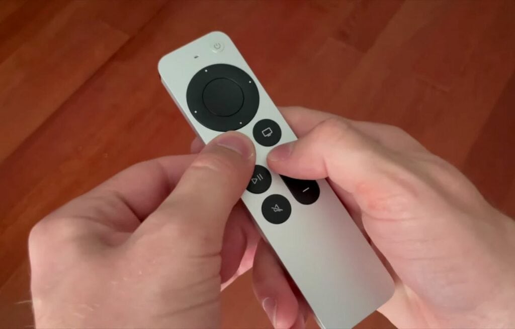 pressing the back and volume up button on an Apple TV remote