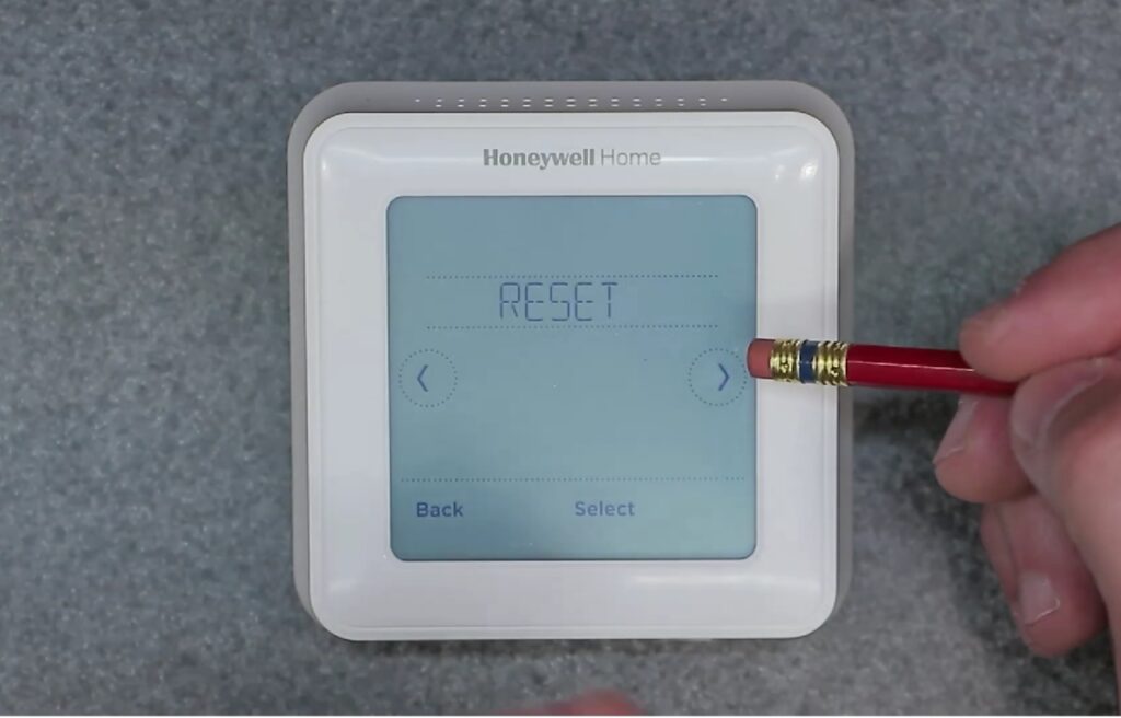 Reset showing on the screen of a Honeywell T5 tthermostat