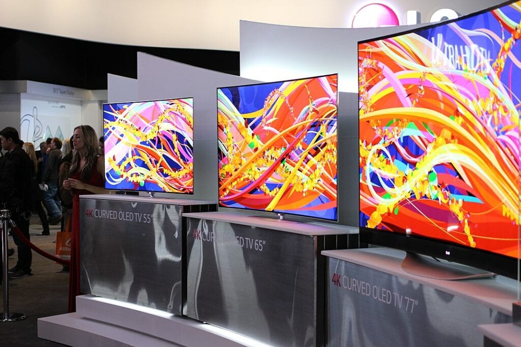 Three curved LG TV displayed in the mall