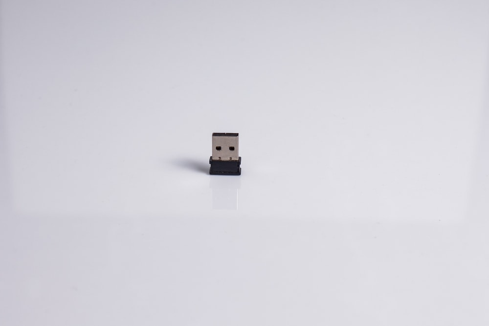 USB Bluetooth adapter on a white table