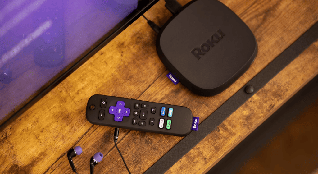 Roku Ultra streaming device on a wooden tabble