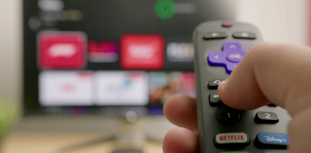 pointing a Roku remote on a TV